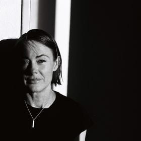 black and white portrait image of Siobhan Bradshaw smiling